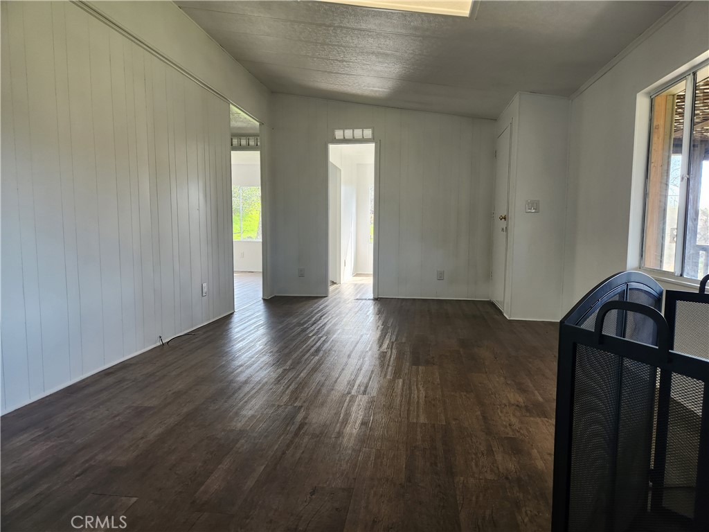 356 Chinese Wall Road Oroville, CA 95966 - Photo 27 of 30 a view of a hallway with wooden floor and stairs