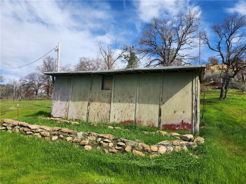 356 Chinese Wall Road Oroville, CA 95966 - Photo 28 of 30 a view of backyard with barbeque grill and plants