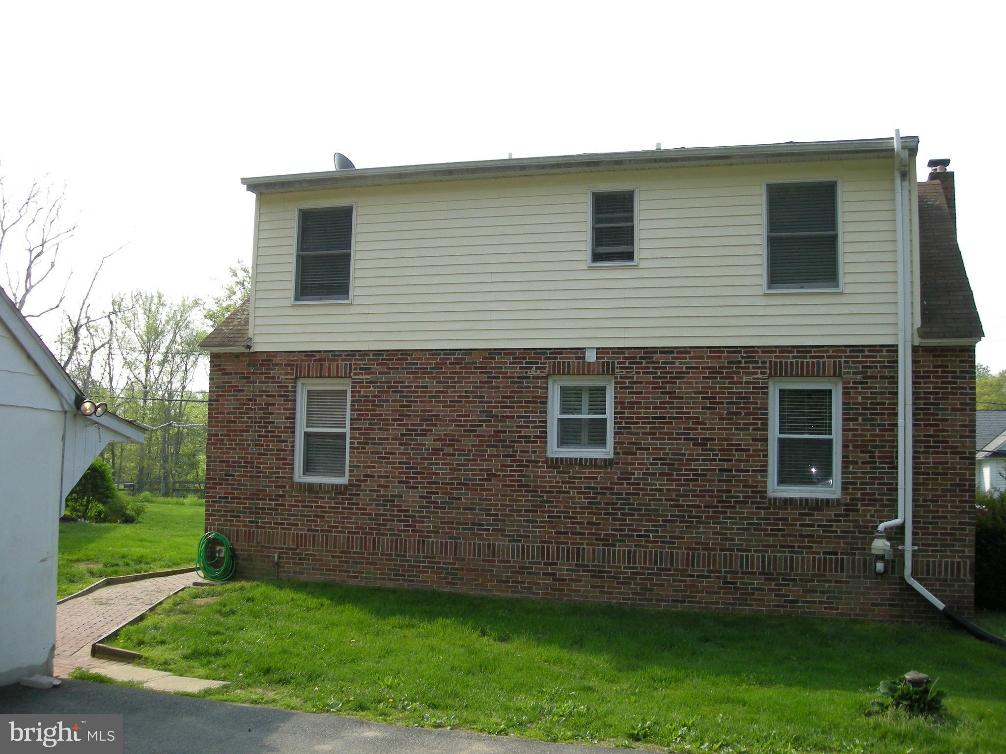 1008 Old Joppa Road Joppa, MD 21085 - Photo 3 of 17 Exterior Back of Home, Garage to the left