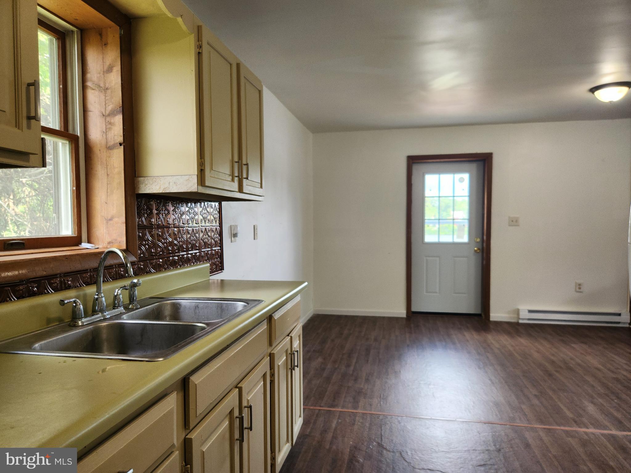 403 Rose Street Salisbury, MD 21801 - Photo 14 of 35 a kitchen that has a sink and a granite counter tops