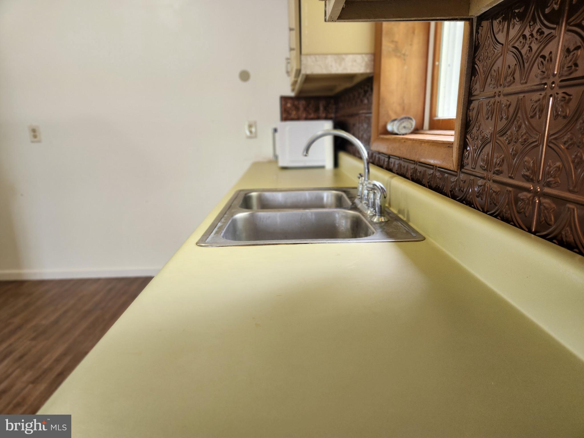 403 Rose Street Salisbury, MD 21801 - Photo 16 of 35 a view of an empty room with wooden floor