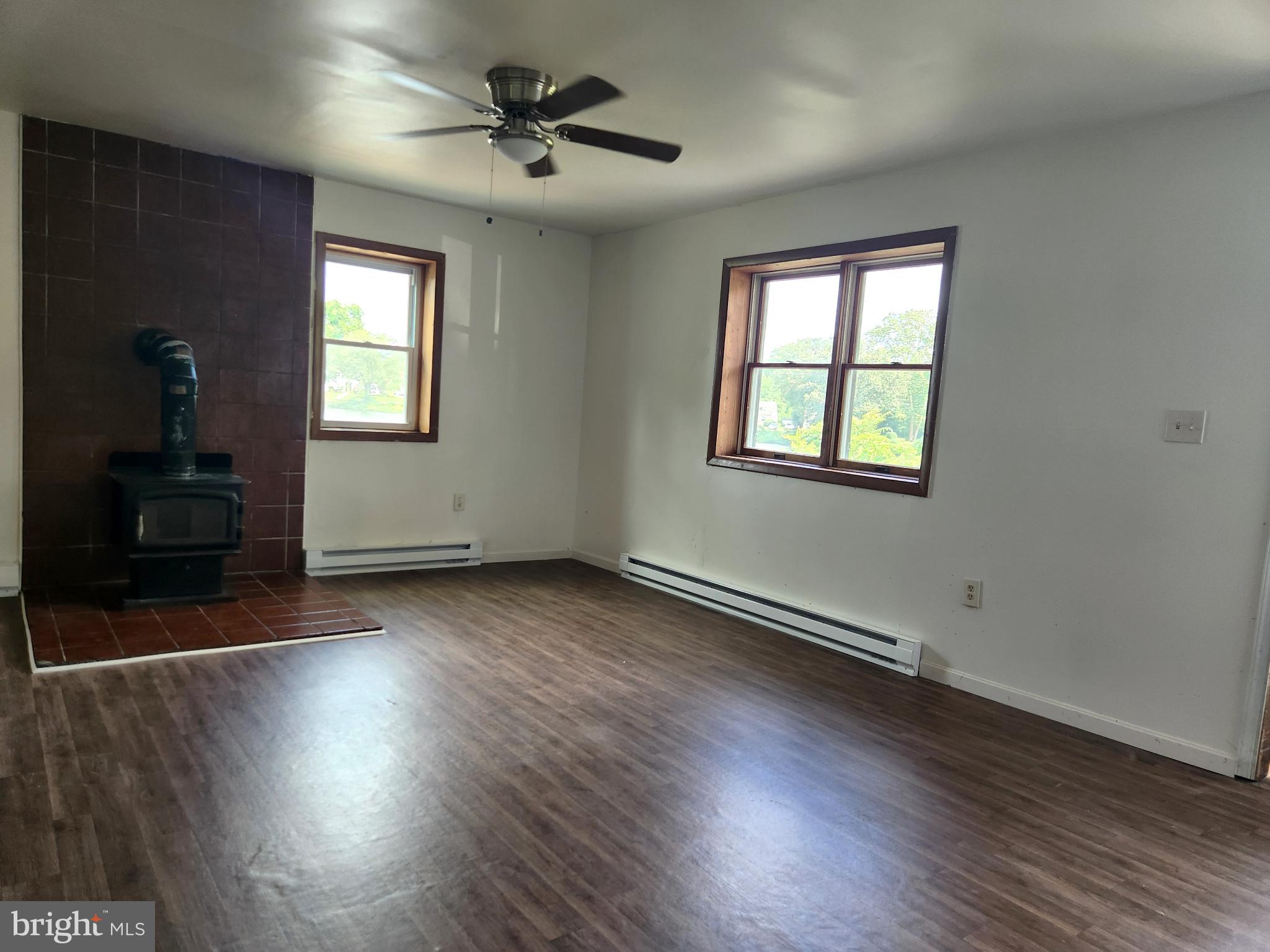 403 Rose Street Salisbury, MD 21801 - Photo 21 of 35 wooden floor in an empty room with a window