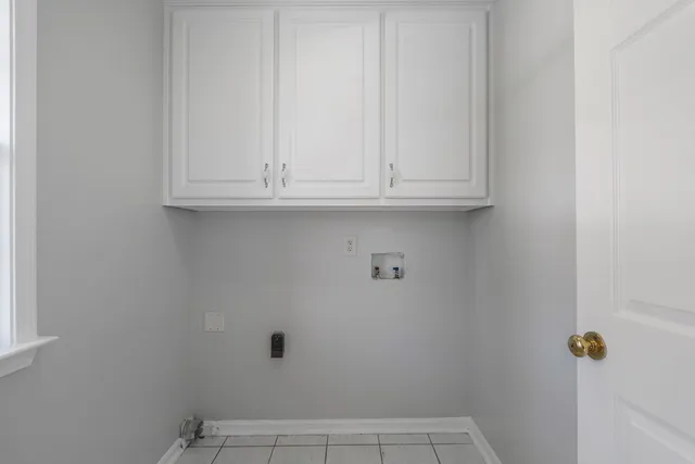 an empty room with dishwasher