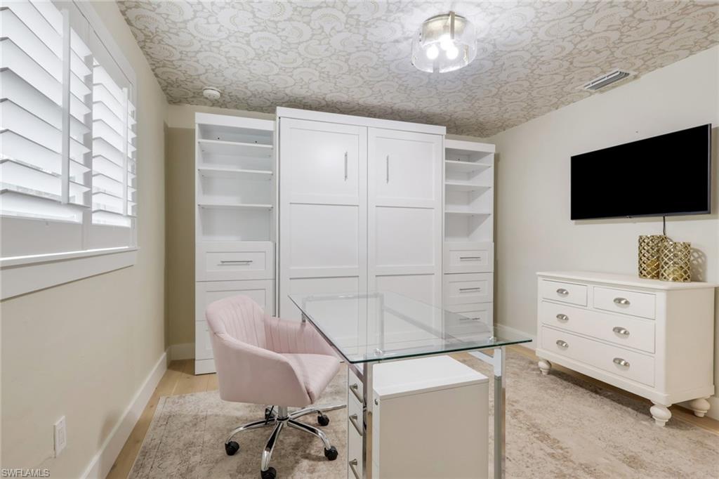 695 Regatta Road Naples, FL 34103 - Photo 27 of 43 Office space featuring baseboards and light wood finished floors