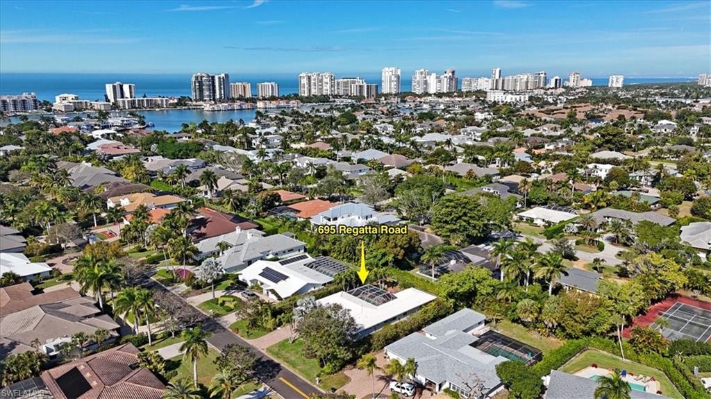 695 Regatta Road Naples, FL 34103 - Photo 41 of 43 View of property location featuring city skyline and a nearby body of water