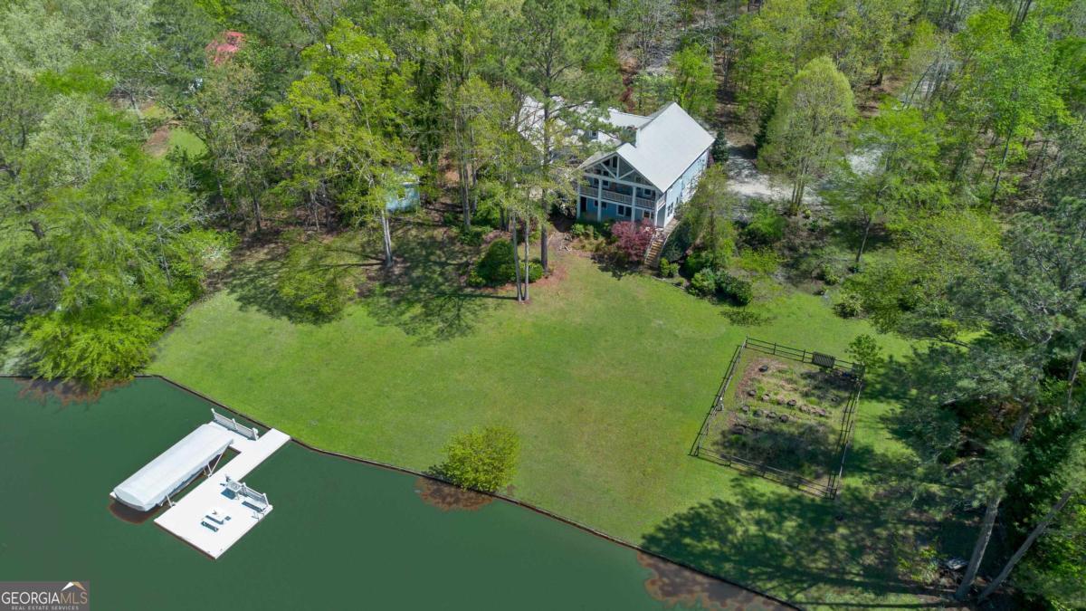 1320 Tal Lewis Road White Plains, GA 30678 - Photo 6 of 7 a view of a garden in a patio