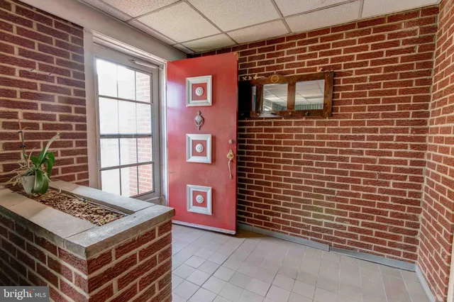 a brick building with a door