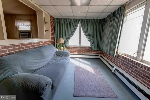 a view of room with window and stairs