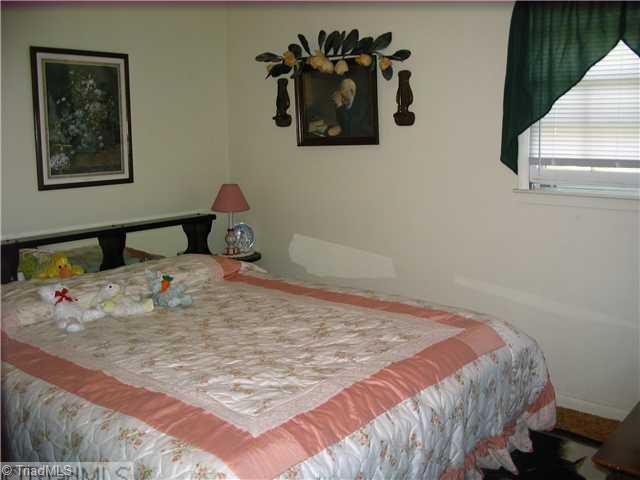 7129 Ellison Road Stokesdale, NC 27357 - Photo 11 of 16 Master Bedroom.