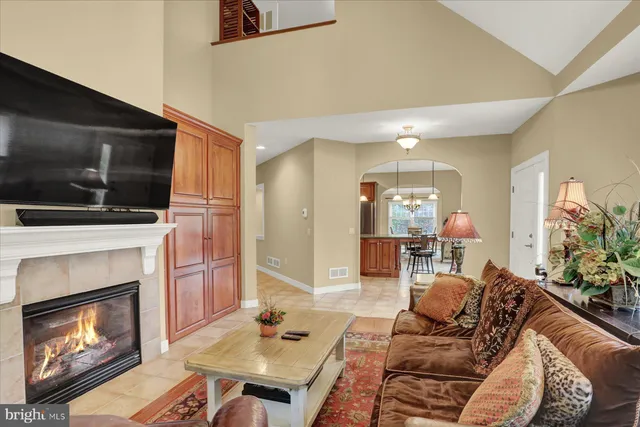 a living room with furniture and a table