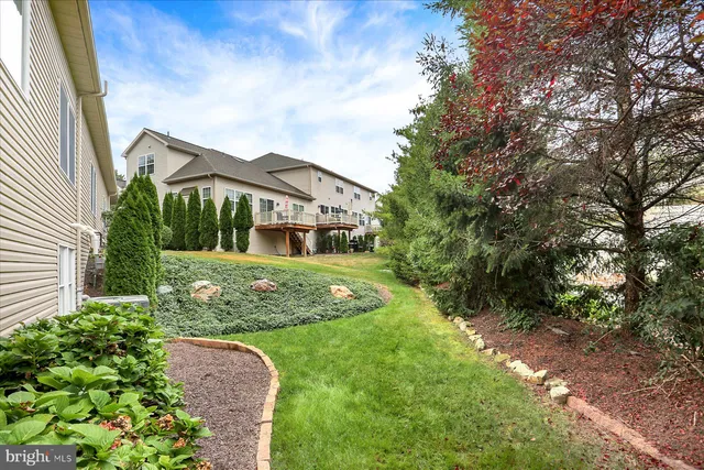 a view of a backyard with garden