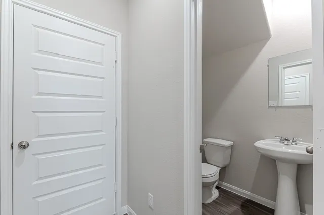 a bathroom with a sink and a toilet