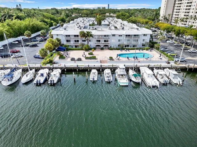 an aerial view of a house a swimming pool and outdoor space