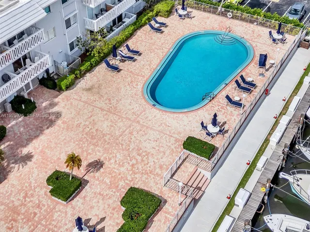 a view of multiple houses with outdoor space