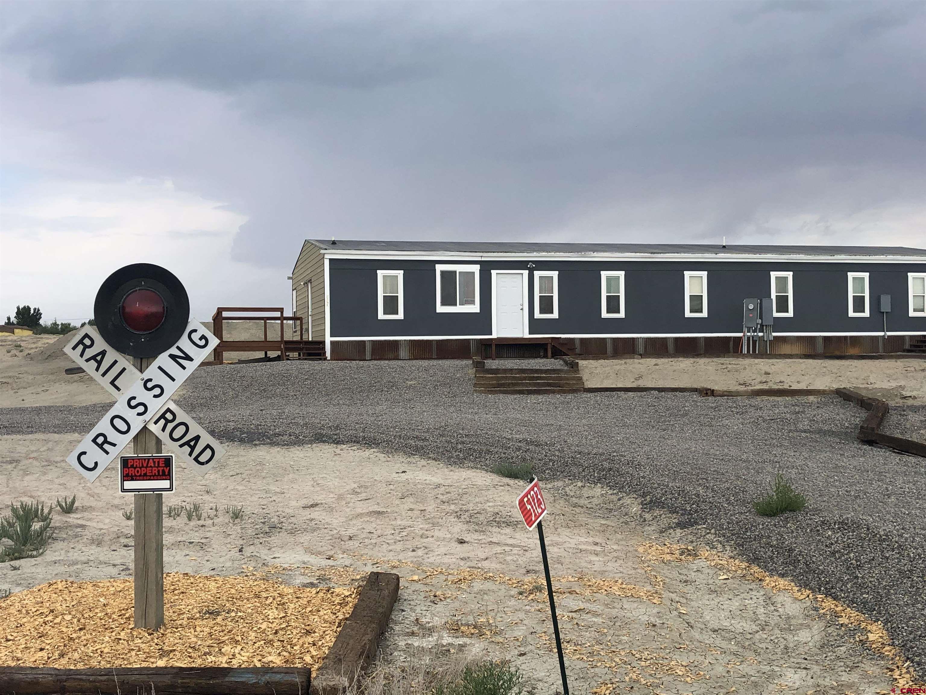 5123 Flint Delta, CO 81416 - Photo 2 of 24 a front view of a house with garden