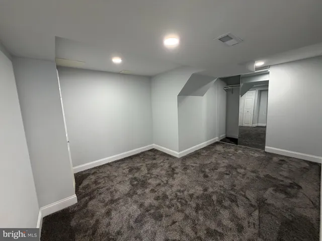 an empty room with a natural light