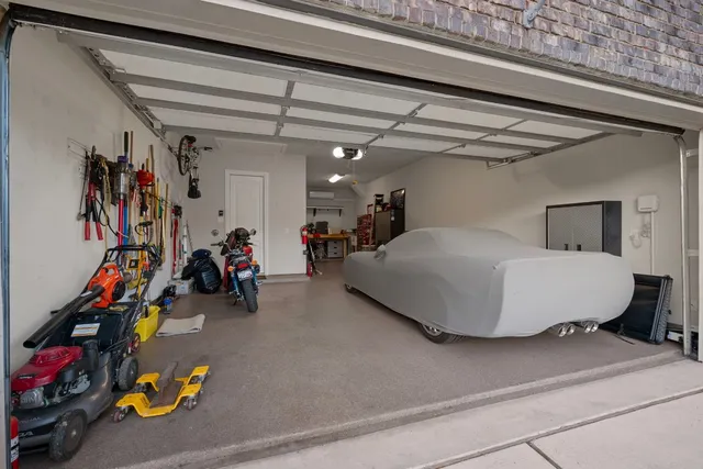 a bedroom with furniture and a gym