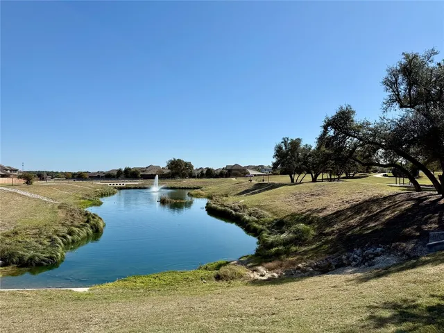 a view of a lake with outdoor space