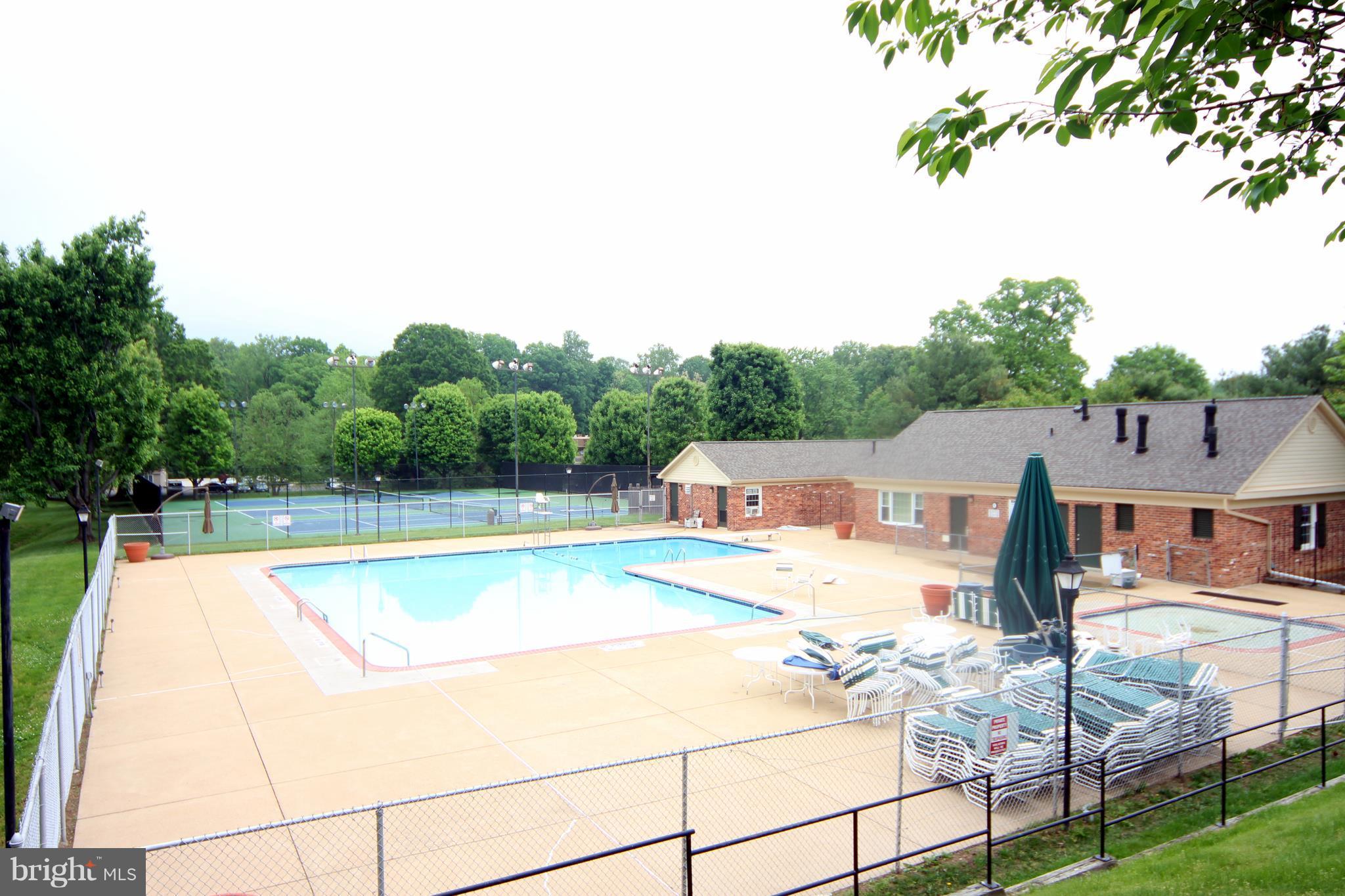 5903 Kingsford Road, Unit H Springfield, VA 22152 - Photo 15 of 18 a view of a swimming pool with a patio