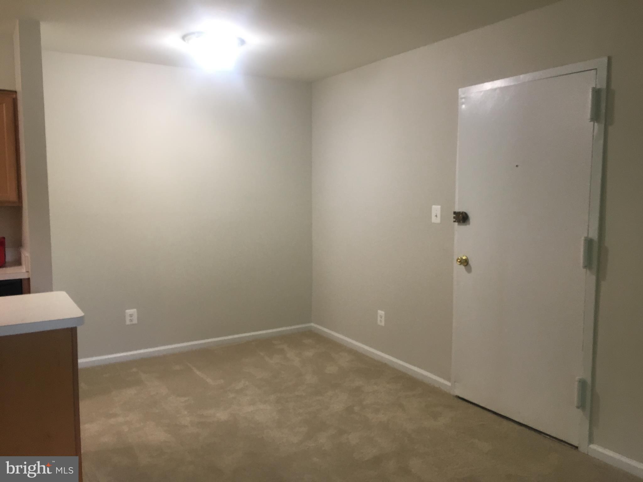 5903 Kingsford Road, Unit H Springfield, VA 22152 - Photo 7 of 18 a view of an empty room