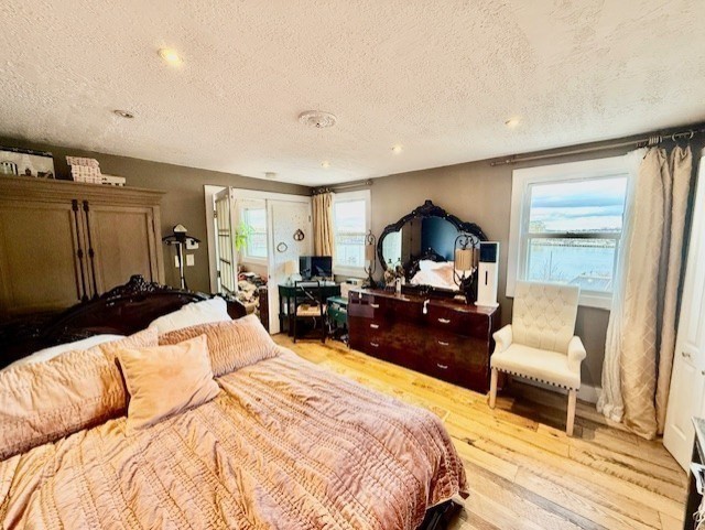 480 Commercial Street, Unit 5A Boston, MA 02109 - Photo 28 of 41 a bedroom with a bed window and couch