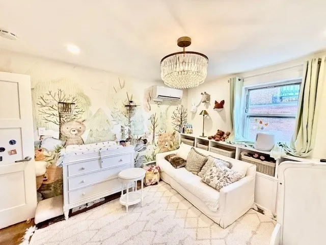 a view of a livingroom with furniture and windows