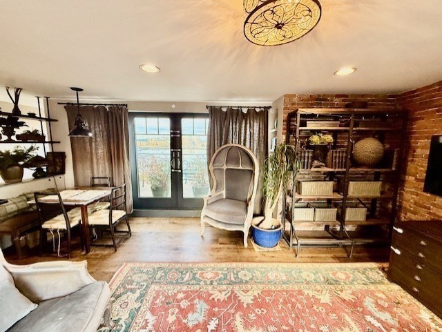 480 Commercial Street, Unit 5A Boston, MA 02109 - Photo 8 of 41 a living room with furniture a rug and decor