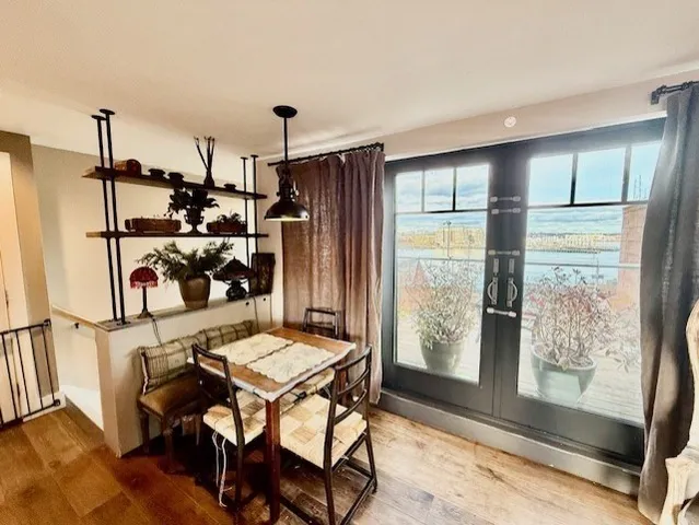 a view of a dining room with furniture window and outside view