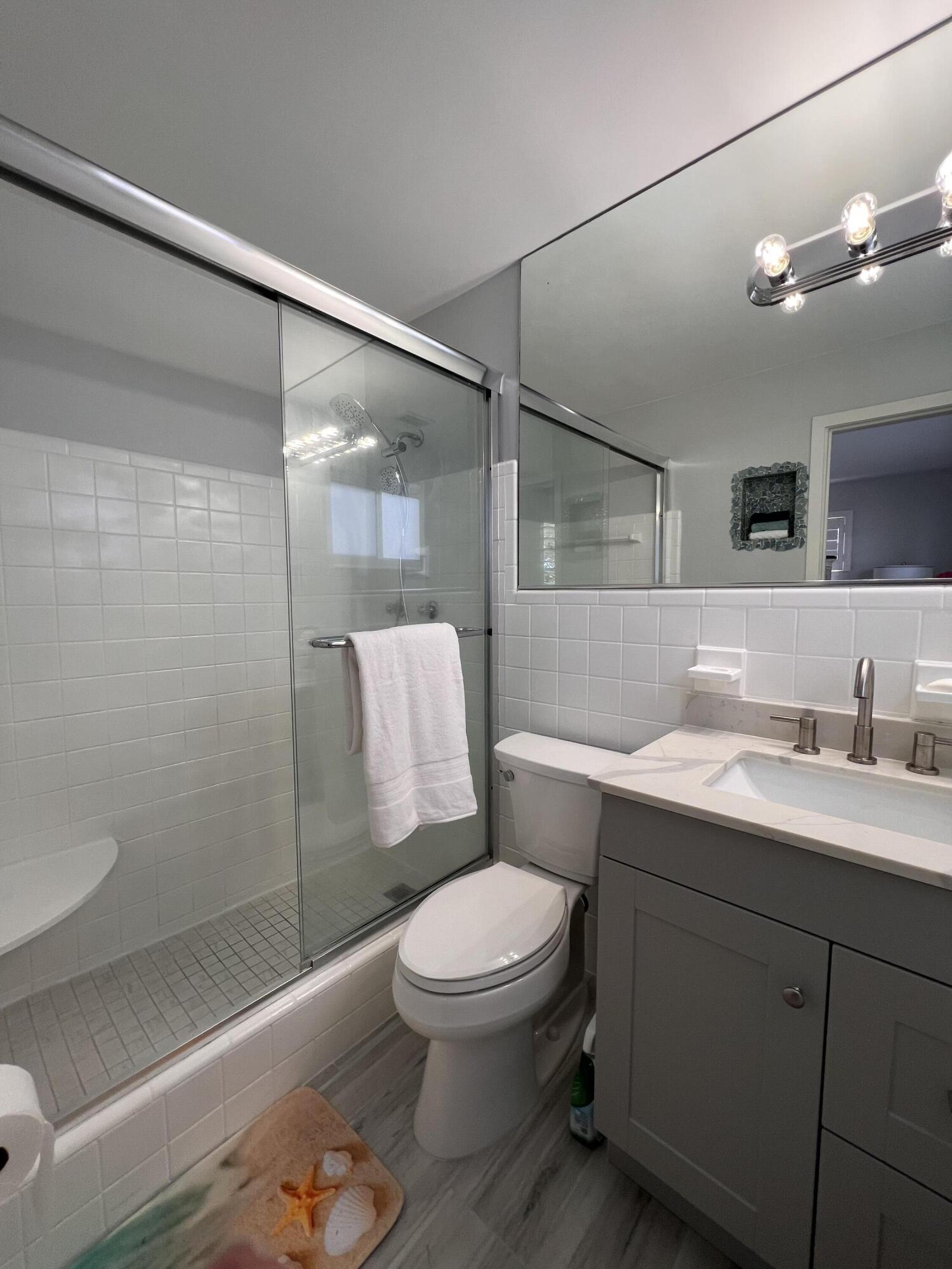 2011 Northeast 31st Street Lighthouse Point, FL 33064 - Photo 22 of 42 Master Bathroom