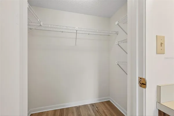 a view of a room with racks on the wall