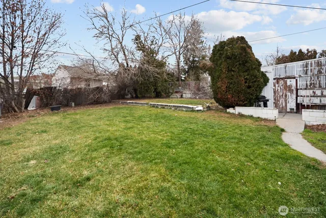 a view of a yard with an outdoor space