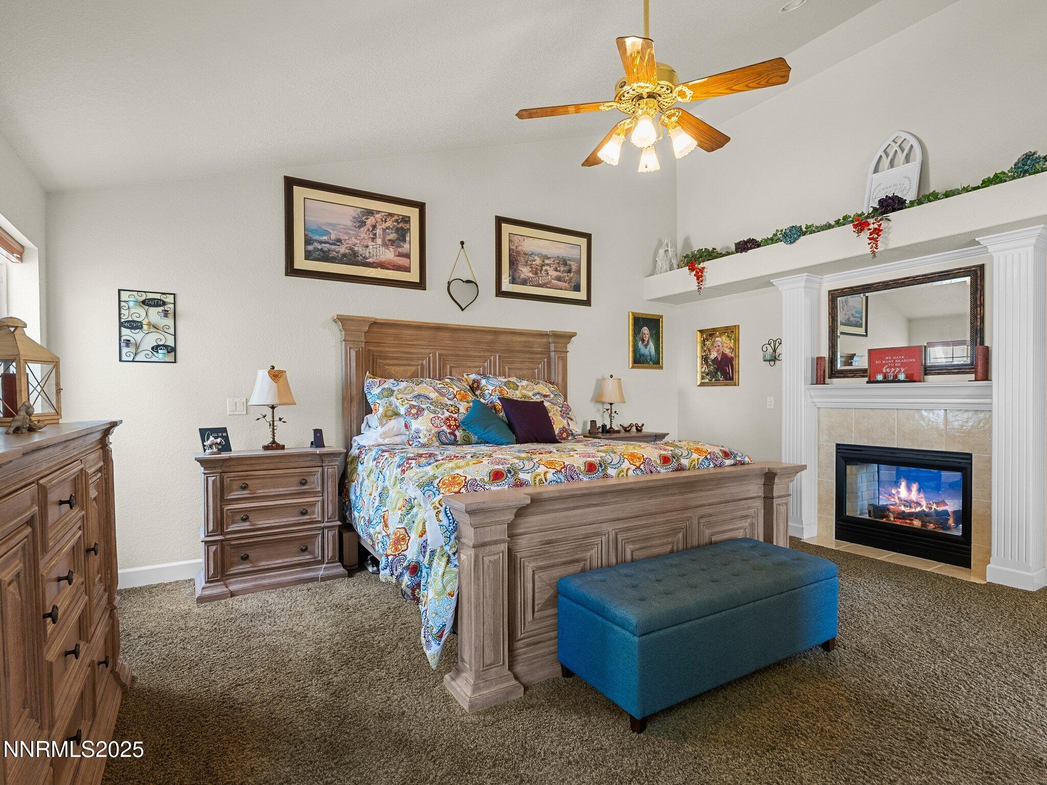 801 Larson Lane Coleville, CA 96107 - Photo 16 of 37 a bedroom with a bed and a fireplace