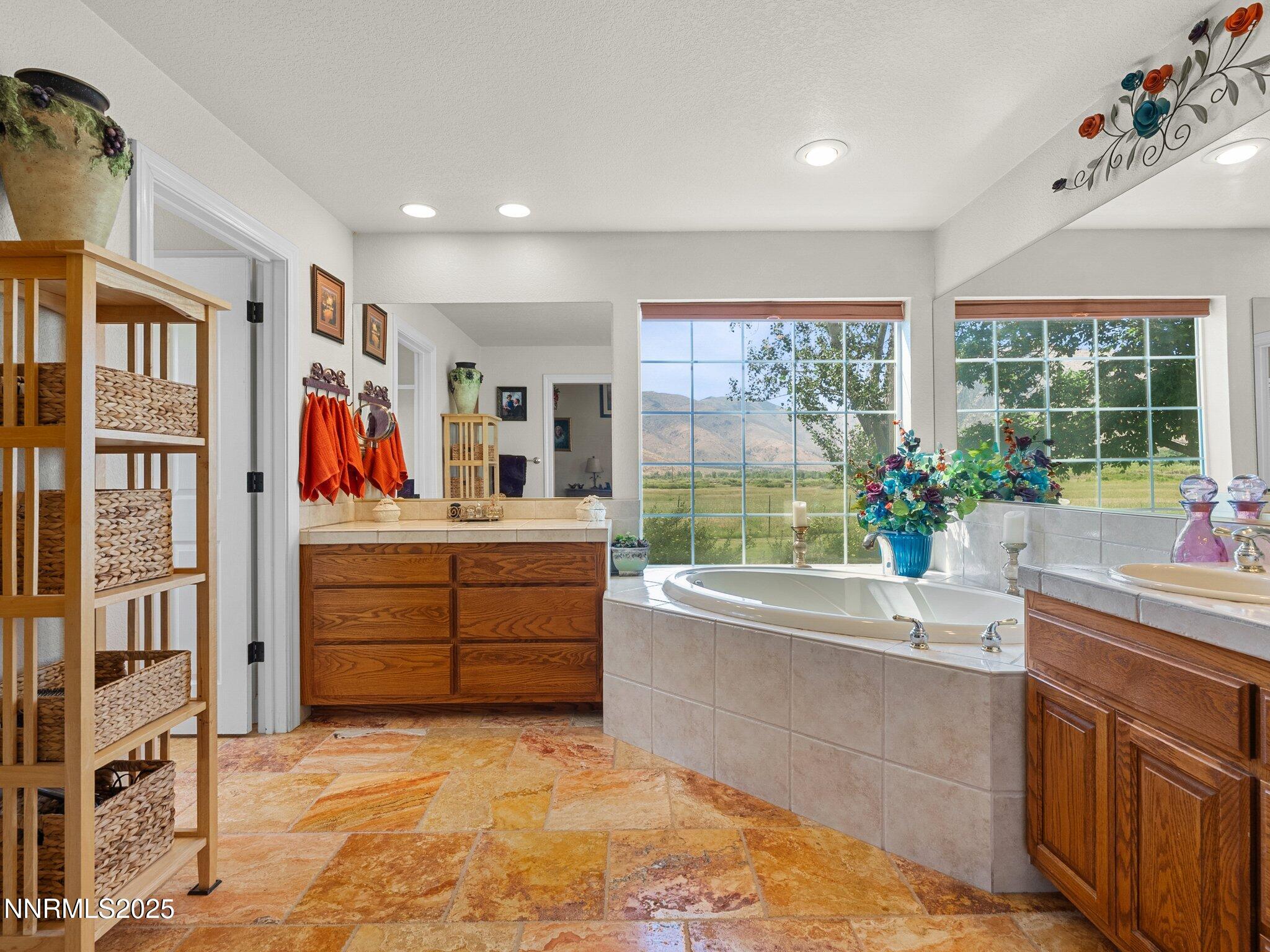 801 Larson Lane Coleville, CA 96107 - Photo 17 of 37 a bathroom with a tub sink and mirror