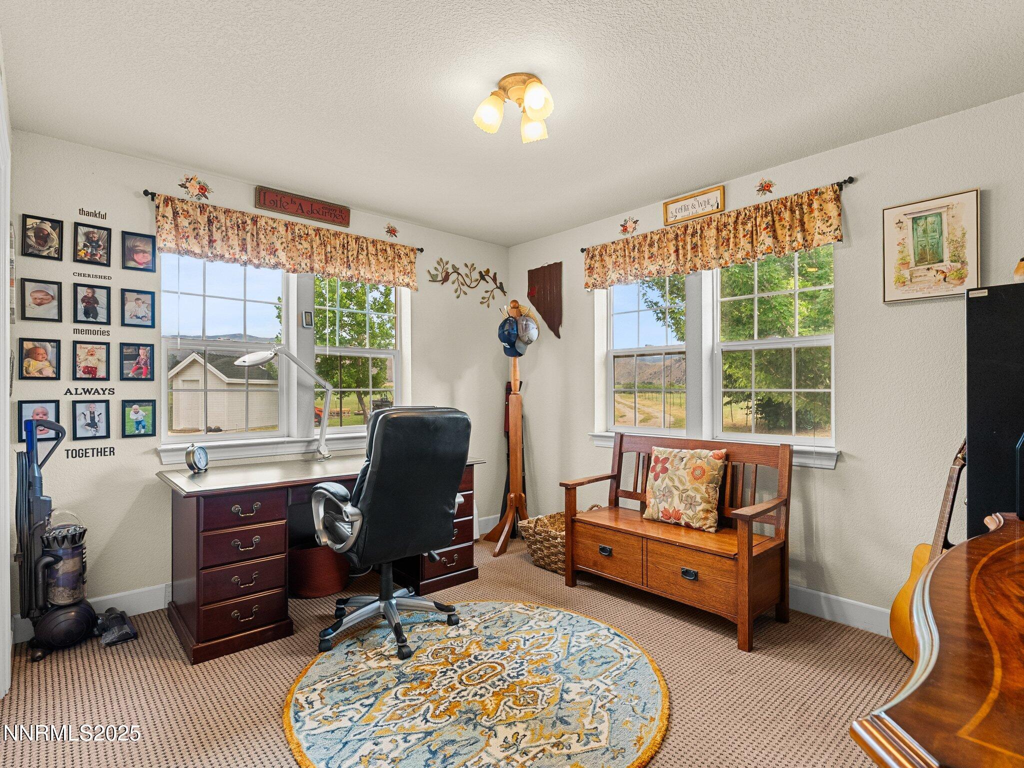 801 Larson Lane Coleville, CA 96107 - Photo 20 of 37 a living room with furniture and a large window