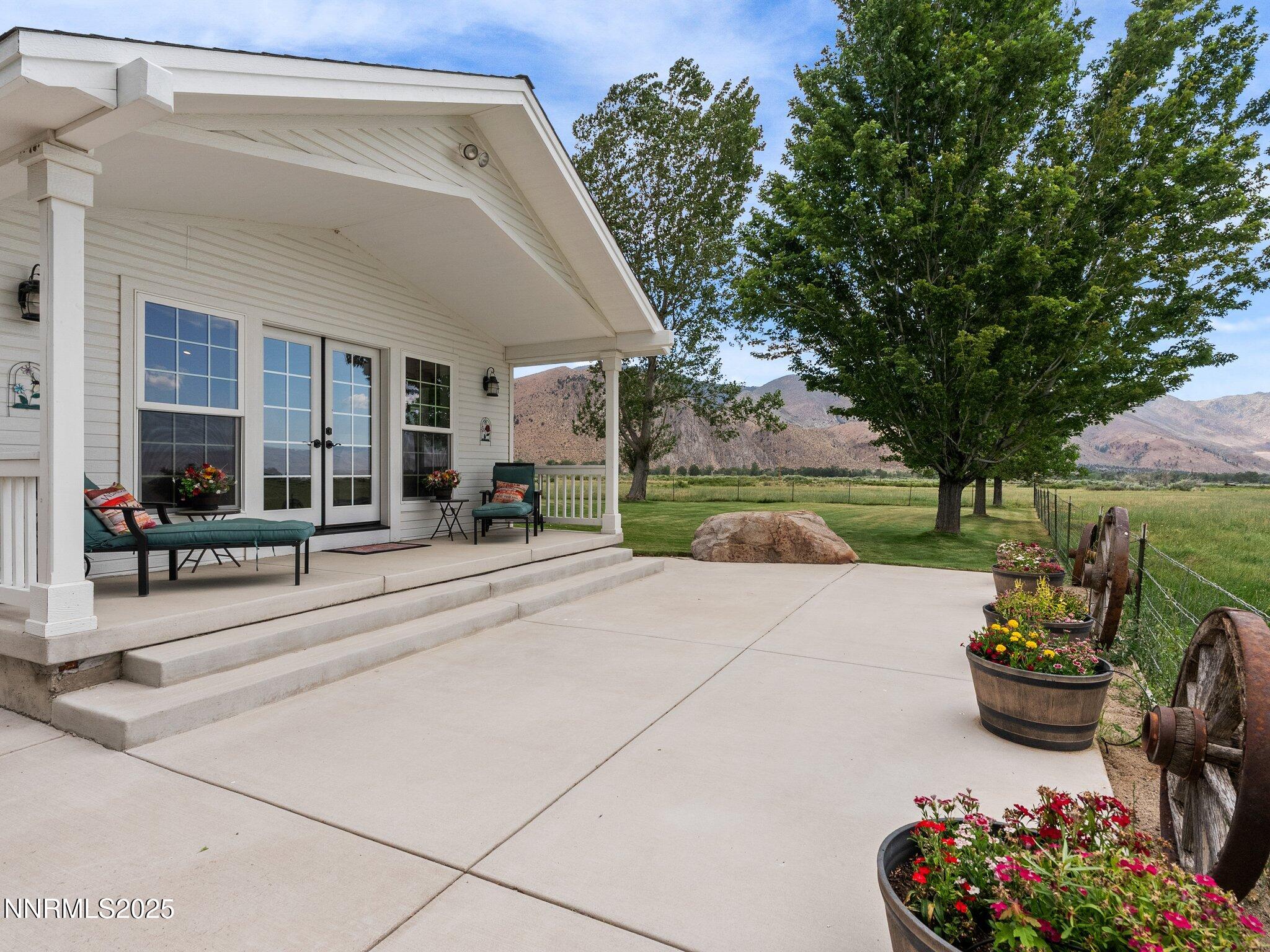 801 Larson Lane Coleville, CA 96107 - Photo 27 of 37 a view of a porch with furniture and a yard