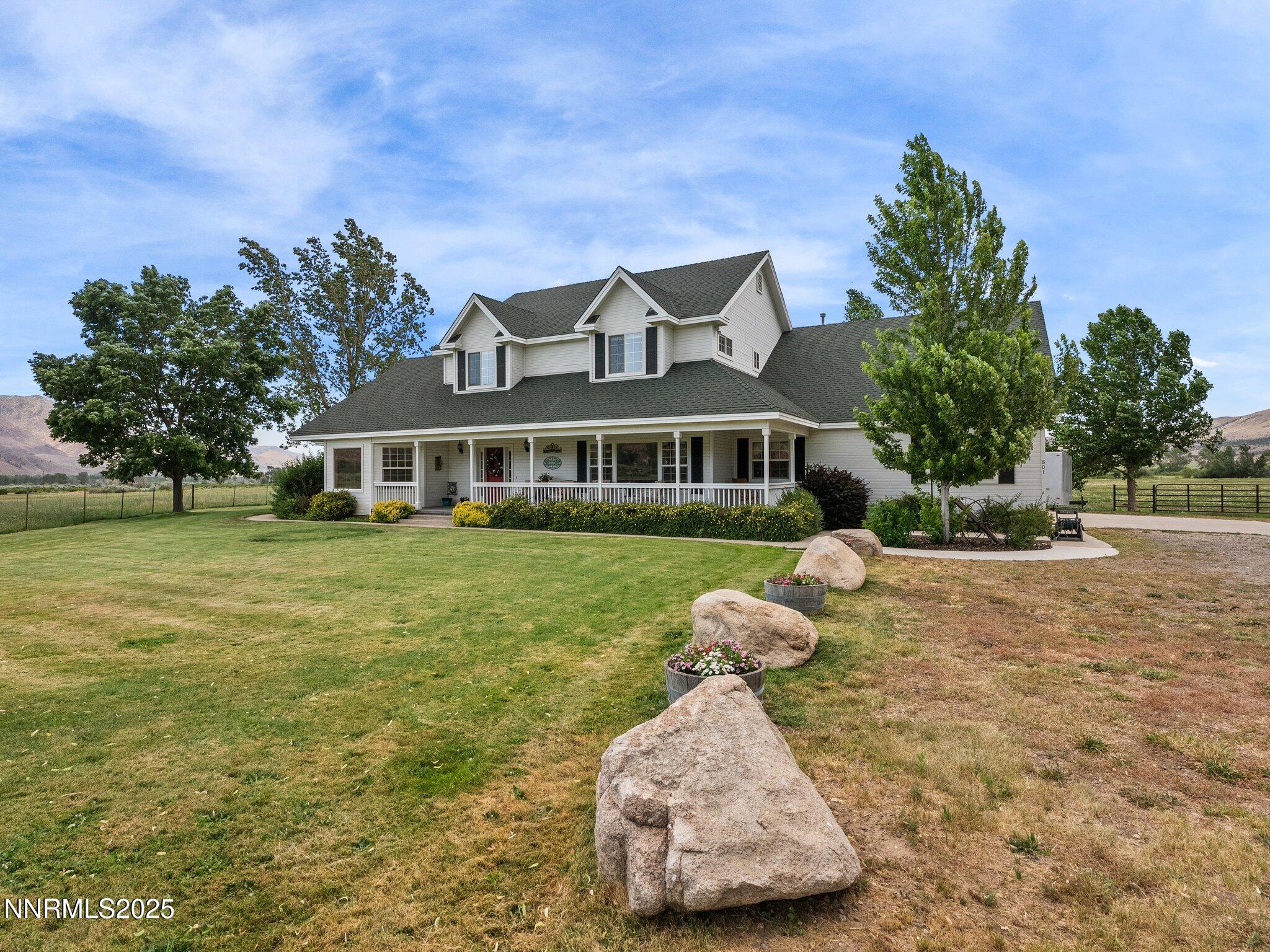 801 Larson Lane Coleville, CA 96107 - Photo 3 of 37 a front view of a house with a yard