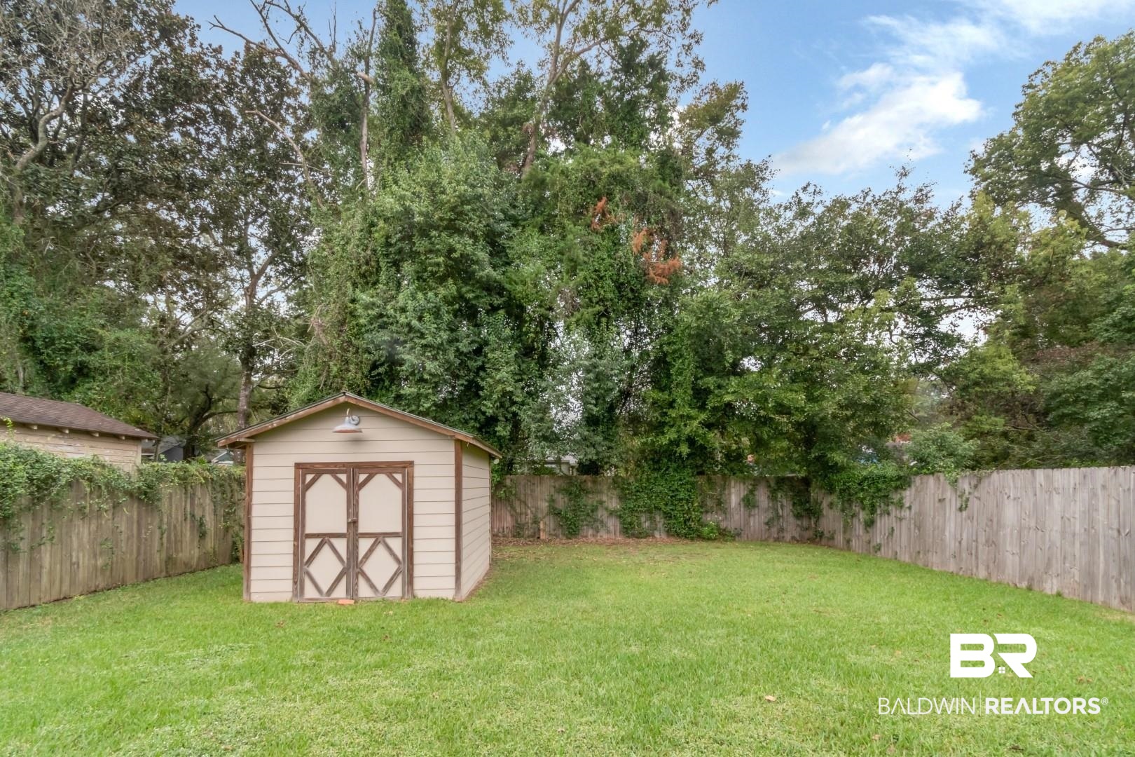 208 Morgan Avenue Mobile, AL 36606 - Photo 24 of 27 View of yard with a storage shed