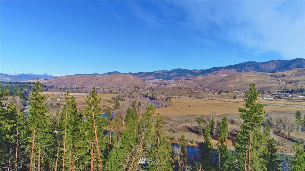 1 Rising Eagle Road, Unit RD Twisp, WA 98856 - Photo 27 of 40 a view of lake and mountain