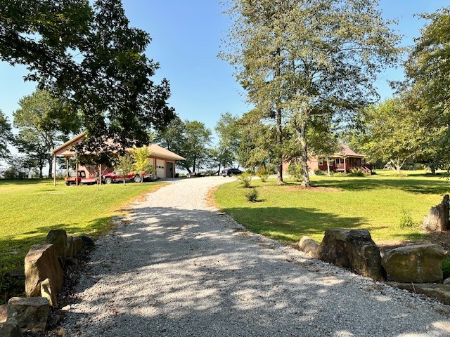 1030 Pine Ridge Lane Clarkrange, TN 38553 - Photo 16 of 30 a view of a swimming pool with an outdoor space and seating area