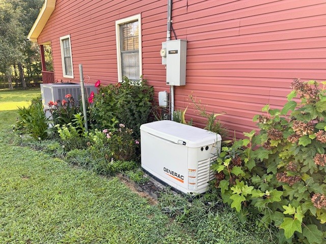 1030 Pine Ridge Lane Clarkrange, TN 38553 - Photo 19 of 30 a white house with a yard and plants