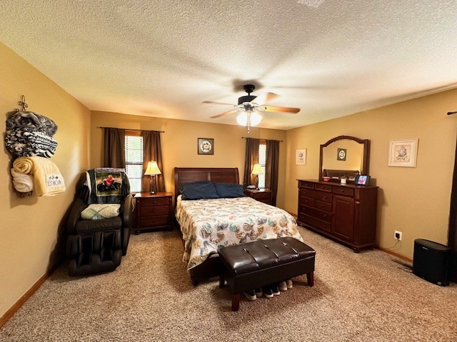 1030 Pine Ridge Lane Clarkrange, TN 38553 - Photo 22 of 30 a bedroom with a bed and a couch