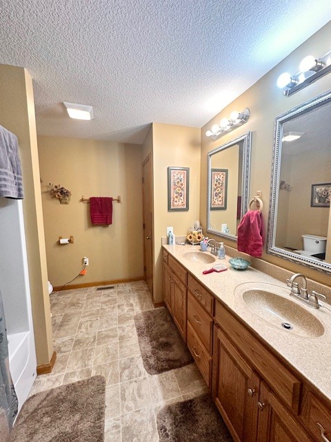 1030 Pine Ridge Lane Clarkrange, TN 38553 - Photo 23 of 30 a spacious bathroom with a tub sink and mirror