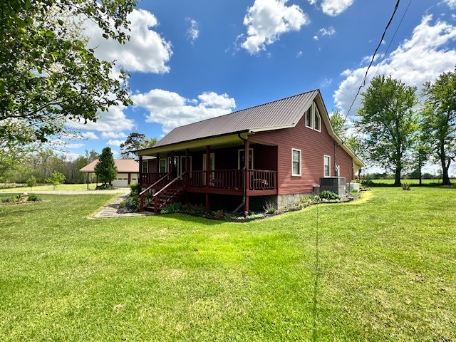 1030 Pine Ridge Lane Clarkrange, TN 38553 - Photo 3 of 30 a view of a house with a yard and sitting area