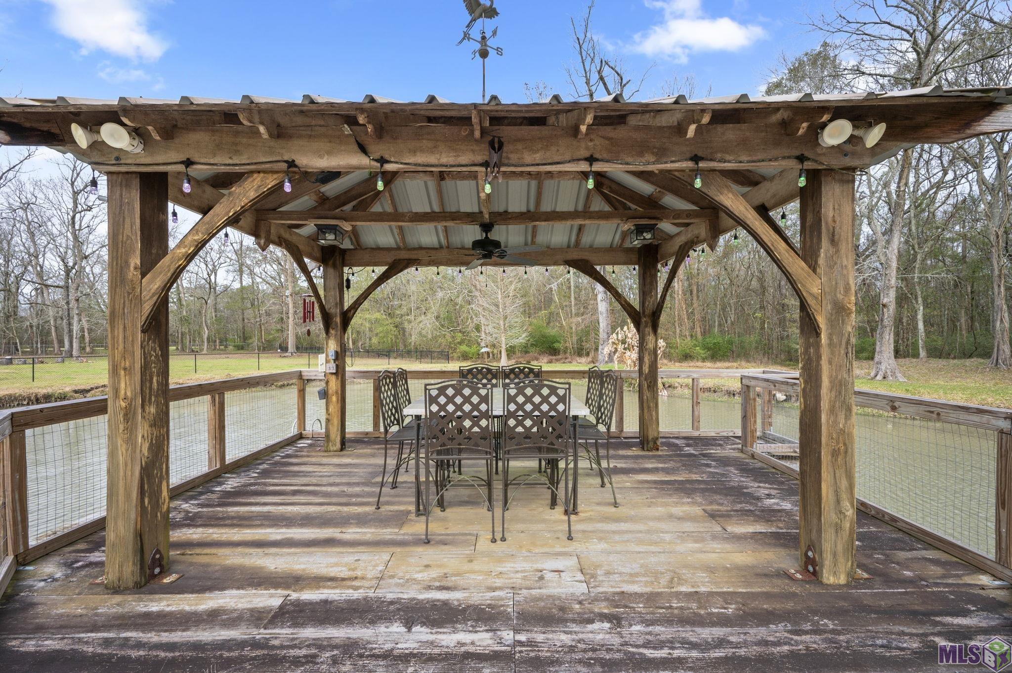 5775 Bayou Paul Road St. Gabriel, LA 70776 - Photo 29 of 44 Dock over lake