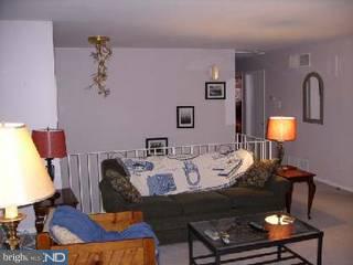 39 Fordham Road Pennsville, NJ 08070 - Photo 3 of 6 a living room with furniture and wooden floor