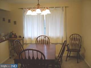 39 Fordham Road Pennsville, NJ 08070 - Photo 6 of 6 a view of a dining room with furniture and chandelier
