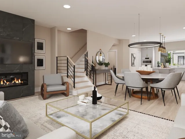 a living room with fireplace furniture and a flat screen tv