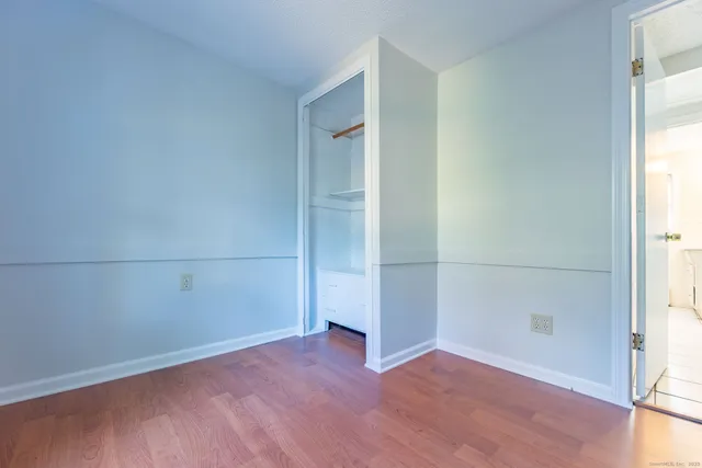 an empty room with a empty space and window