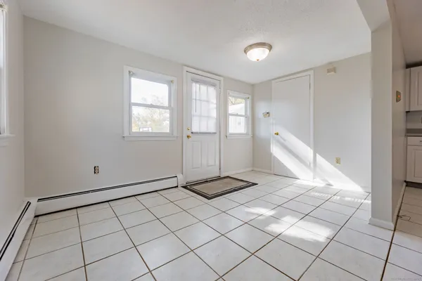 a view of an empty room and window