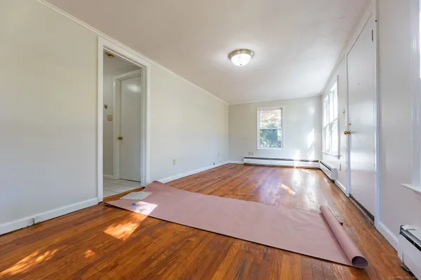 a view of an empty room and window
